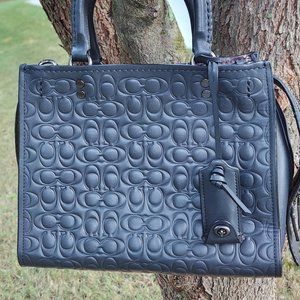 coach rogue 25 in signature leather with floral bow print interior